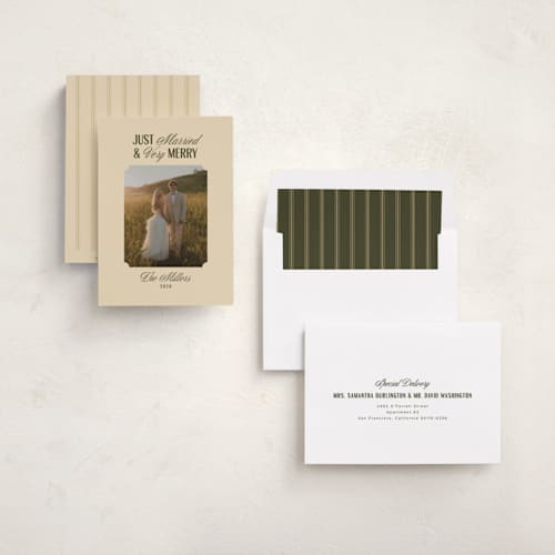 This is a ivory holiday photo cards with standard by Ana de Sousa called just married & merry printing on recycled smooth signature in standard