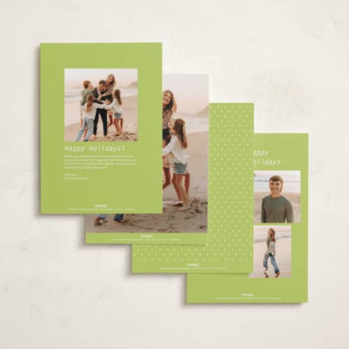 This is a mistletoe glow holiday photo cards with standard by JoAnn Jinks called neon vintage printing on recycled smooth signature in standard