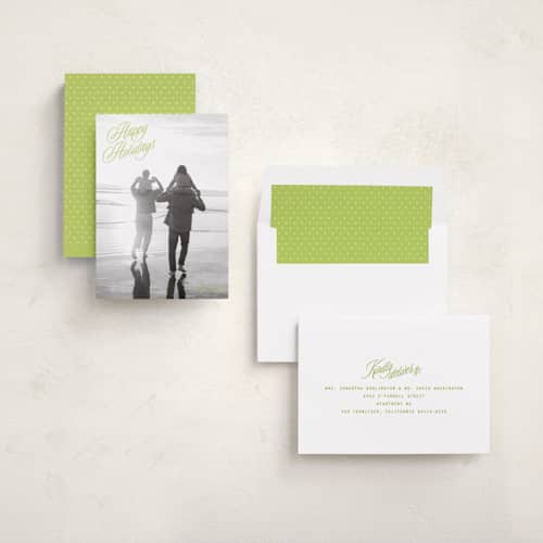 This is a mistletoe glow holiday photo cards with standard by JoAnn Jinks called neon vintage printing on recycled smooth signature in standard