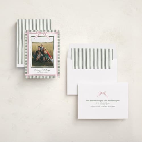This is a pink sand holiday photo cards with standard by Chris Griffith called holiday wrap printing on recycled smooth signature in standard