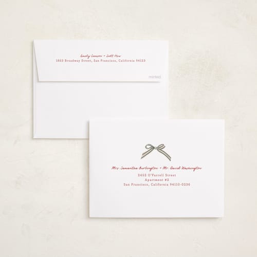 This is a ruby holiday photo cards with standard by Chris Griffith called holiday wrap printing on recycled smooth signature in standard