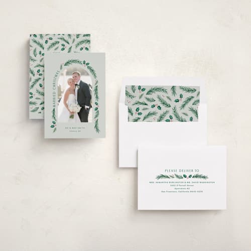 This is a sage holiday photo cards with standard by Hooray Creative called a married christmas printing on recycled smooth signature in standard