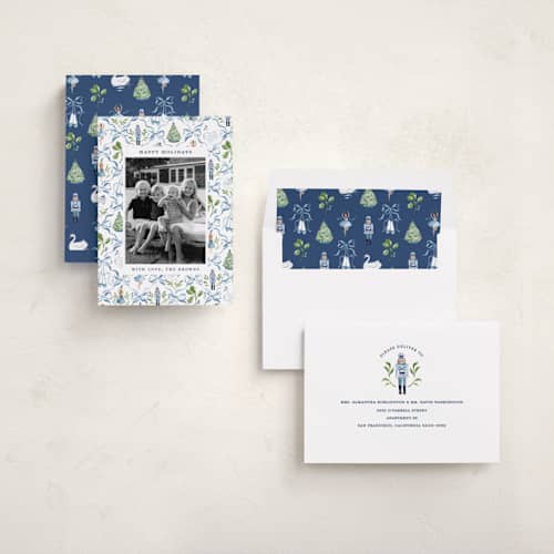 This is a blue ribbon holiday photo cards with standard by Sarah Knight called nutcracker ribbons printing on recycled smooth signature in standard
