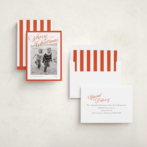 This is a poppy holiday photo cards with standard by Chris Griffith called holiday play printing on recycled smooth signature in standard