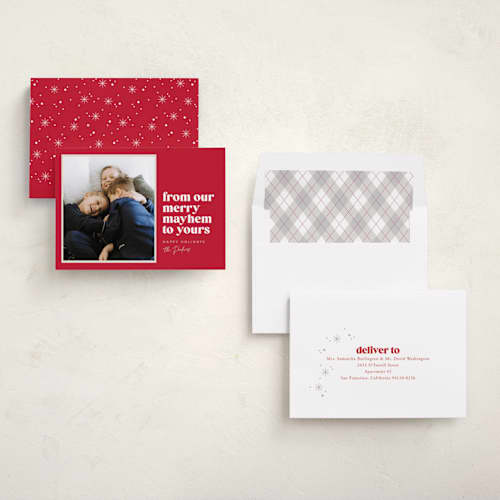 This is a holly berry holiday photo cards with standard by Robert and Stella called our merry mayhem printing on recycled smooth signature in standard