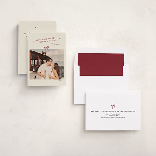 This is a cinnamon holiday photo cards with standard by Ani Somi called merry little bow printing on recycled smooth signature in standard