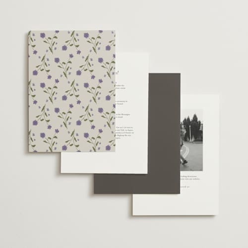 This is a petal foil stamped wedding invitations with foil pressed by Nicoletta Savod called parisian garden printing on signature in standard