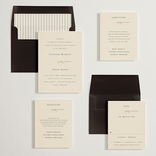 This is a ivory foil stamped wedding invitations with foil pressed by Baumbirdy called bow tie printing on signature in standard