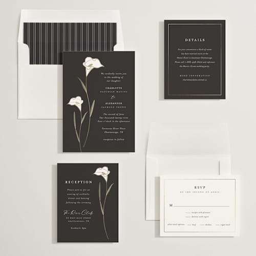 This is a ink foil stamped wedding invitations with foil pressed by Stacey Meacham called elegant lillies printing on signature in standard