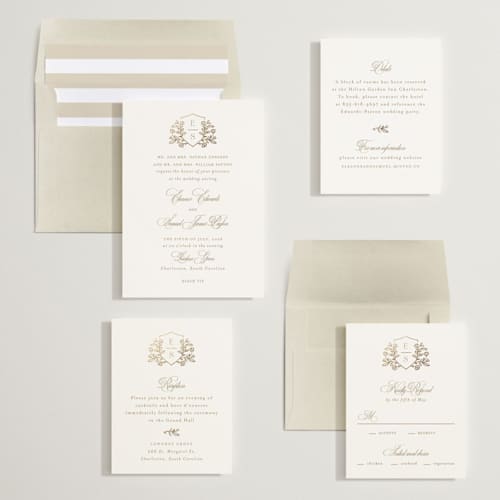 This is a ivory foil stamped wedding invitations with foil pressed by Mansi Verma called gold crest printing on signature in standard