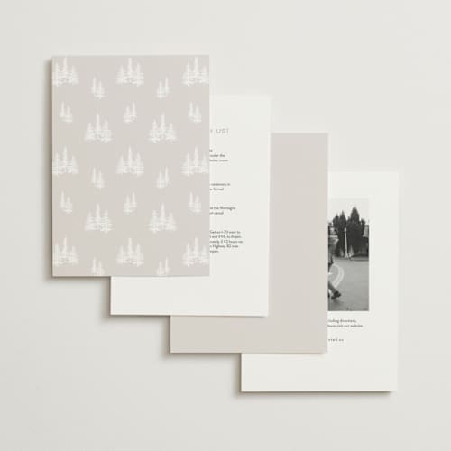 This is a snow foil stamped wedding invitations with foil pressed by Stacy Maalouf called gilded forest printing on signature in standard