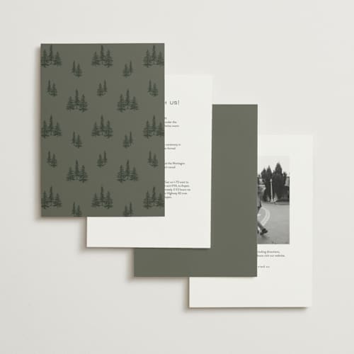 This is a pine foil stamped wedding invitations with foil pressed by Stacy Maalouf called gilded forest printing on signature in standard