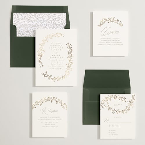This is a powder foil stamped wedding invitations with foil pressed by Creo Study called leafy garland printing on signature in standard