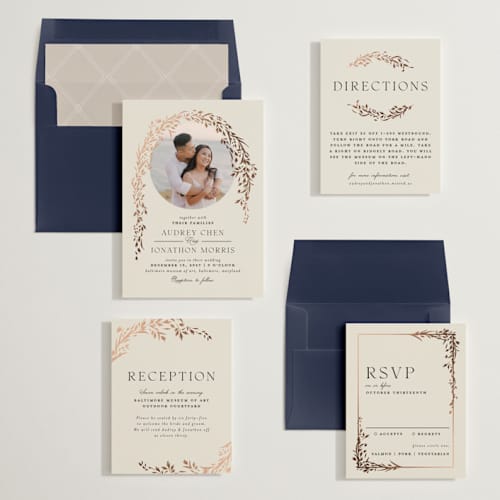 This is a almond foil stamped wedding invitations with foil pressed by Erin L. Wilson called trailing vines printing on signature in standard