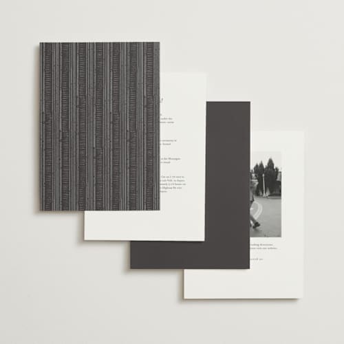 This is a midnight foil stamped wedding invitations with foil pressed by Shiny Penny Studio called deco spring florals printing on signature in standard