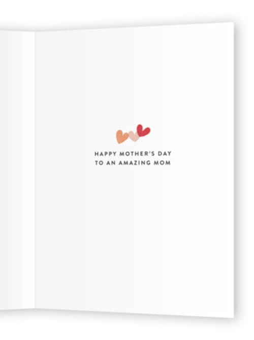 This is a heart mothers day cards with standard by Corinne Malesic called mom in a million printing on signature in greeting cards