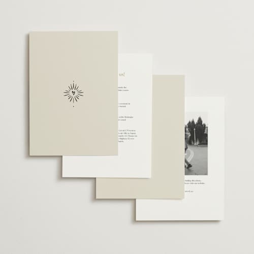 This is a ivory wedding invitations with standard by Ani Somi called milagro printing on signature in standard