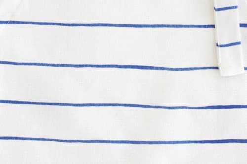This is a snorkel blue kids aprons by Melissa Selmin called breton stripe in standard