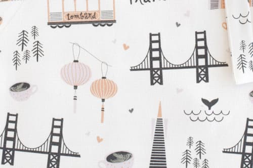 This is a violet kids aprons by Kristie Kern called san francisco in standard