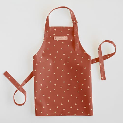 This is a rust kids aprons by Cindy Lackey called golden triangle in standard
