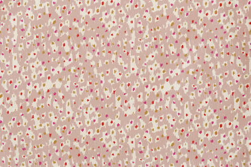 This is a tan kids aprons by Michelle Fifis called animal dots in standard