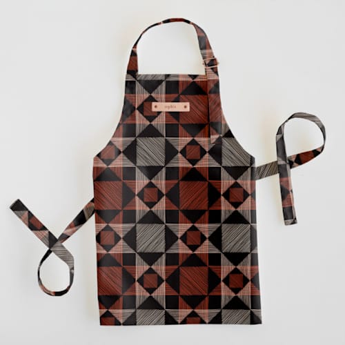 This is a rust kids aprons by Alethea and Ruth called sketched quilt in standard