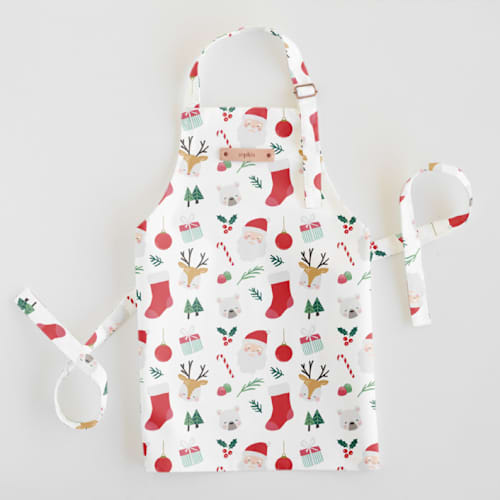 This is a stocking kids aprons by peetie design called sugarplum in standard