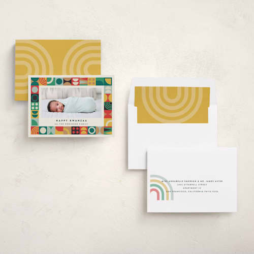 This is a sunset kwanzaa cards with standard by Maria Alou called modern kwanzaa printing on recycled smooth signature in standard