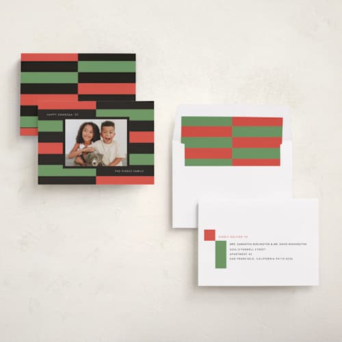 This is a holly kwanzaa cards with standard by letterfix called kwanzaa keys printing on recycled smooth signature in standard