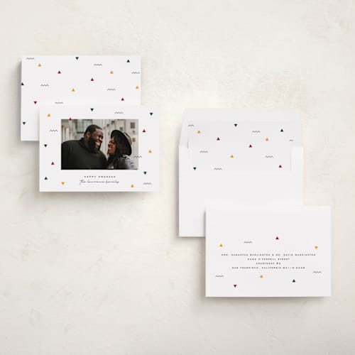 This is a snow kwanzaa cards with standard by Jessica Corliss called kwanzaa confetti printing on recycled smooth signature in standard