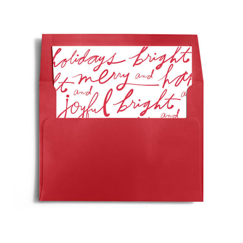 This is a holly wedding envelopes with standard by Ampersand Design Studio called exaggerated merry and bright printing on signature in liner