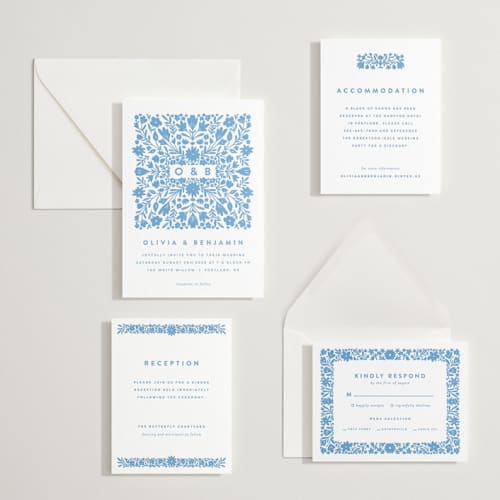 This is a marine blue letterpress wedding invitations with letterpress by Stephanie Hawkes called floral stamp printing on white cotton in standard