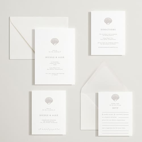 This is a dove grey letterpress wedding invitations with letterpress by Hannah Bowman called simple seashell printing on white cotton in standard