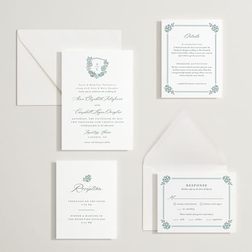 This is a slate letterpress wedding invitations with letterpress by Olivia Raufman called flourishing crest printing on white cotton in standard