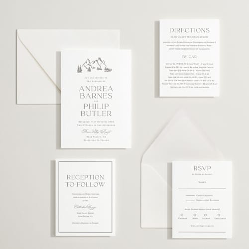 This is a graphite letterpress wedding invitations with letterpress by Lucrecia Caporale called mountain serenity printing on white cotton in standard