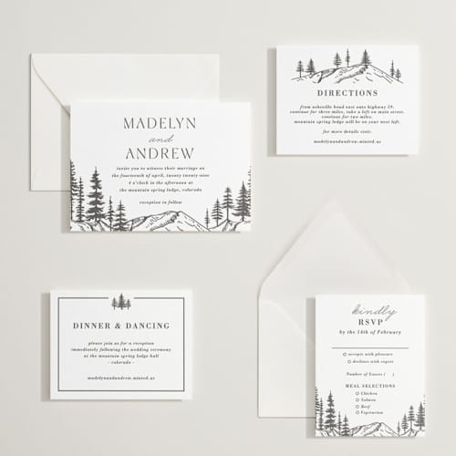 This is a soft black letterpress wedding invitations with letterpress by Winston Latchman called mountain pines printing on white cotton in standard