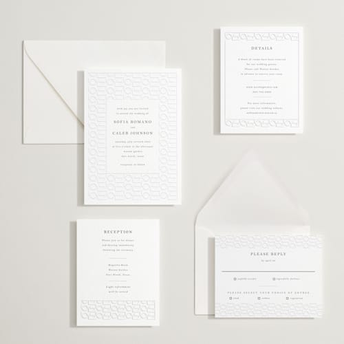 This is a slate letterpress wedding invitations with letterpress by Vera Lim called cerchi printing on white cotton in standard