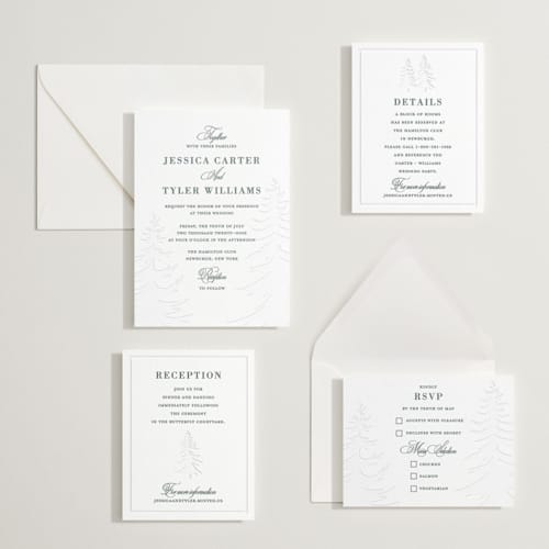 This is a slate letterpress wedding invitations with letterpress by Teju Reval called evergreen printing on white cotton in standard