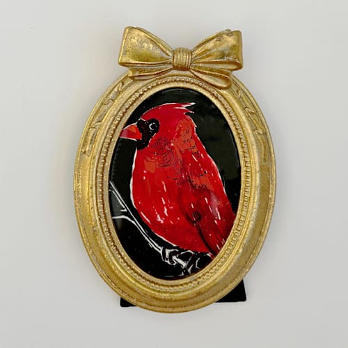 This is a red original paintings by Teju Reval called miniature cardinal in standard
