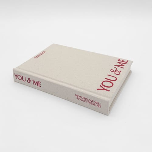 This is a beige wedding gifts by The Ceremony Club called you & me polaroid photo album in standard