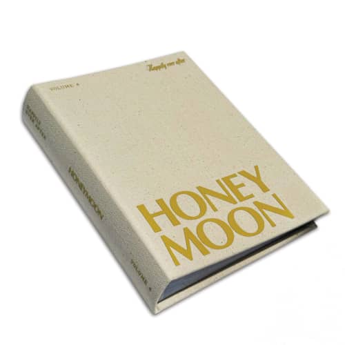 This is a beige wedding gifts by The Ceremony Club called linen honeymoon photo album in standard