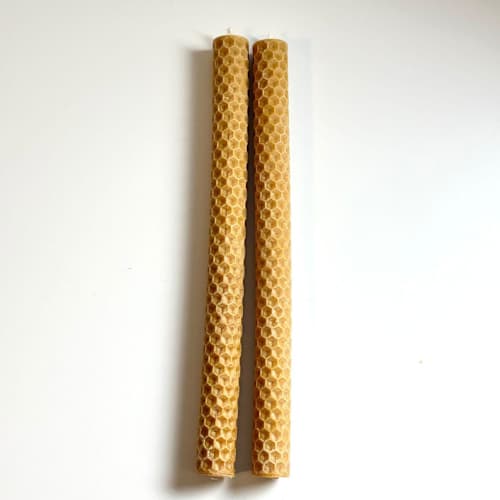 This is a brown candles and candle holders by Over By The Moon called brown honeycomb taper set in standard
