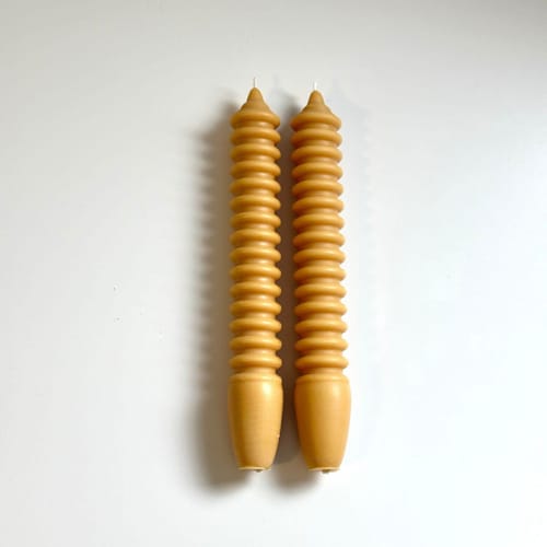 This is a brown candles and candle holders by Over By The Moon called tan horizontal spiral taper set in standard