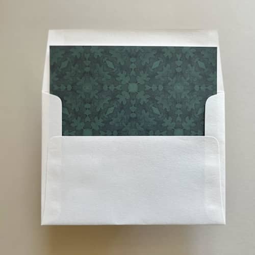 This is a green wedding envelopes by Renée Stramel called a7 envelope liners fresco texture in deep green for straight flap envelopes | pack of 10 in standard