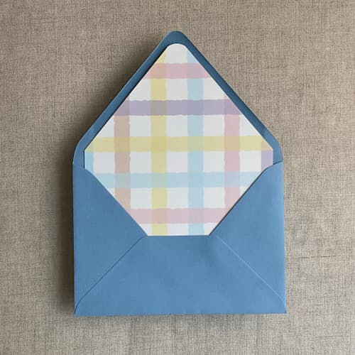 This is a multicolorassorted-colors wedding envelopes by Ivory Invitations called marshmallow checkers envelope liner for a7 euro flap envelope | pack of 10 in standard