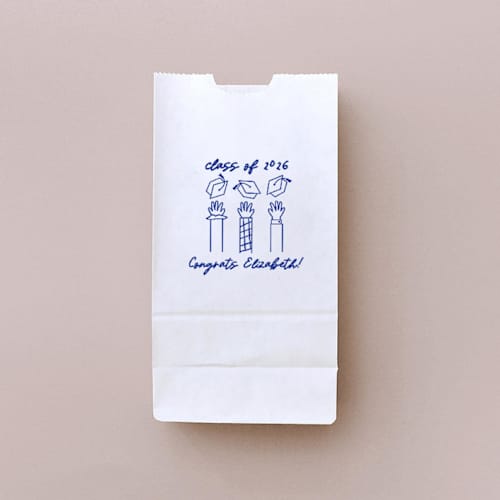 This is a white wedding day of favors by ForYourParty called tossed graduation caps favor bag, set of 25 in standard