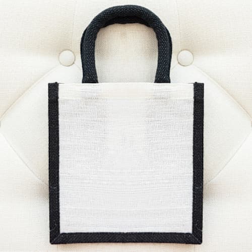 This is a multicolorassorted-colors wedding day of favors by Veronica Esquino called 50 medium wedding welcome bags - white + black in standard