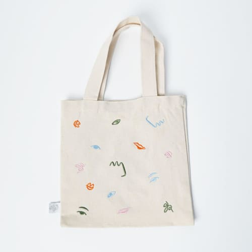 This is a multicolor wedding day of favors by POP Party Supplies called art party embroidered mini tote in standard