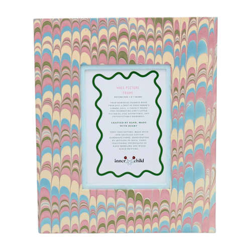 This is a blue accent pieces by Inner Child called hand-marbled large wall picture frame in lilac blue, 5x7 in standard