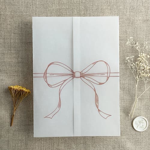 This is a pink vellum wedding invitations by Ivory Invitations called old rose ribbon bow printed vellum wrap for 5x7 card | pack of 10 in standard